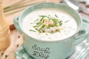 Indulge in the goodness of this creamy white chicken chili, which is both delicious and nutritious. Made with quick-cooking chicken thighs and canned white beans, this recipe is a breeze to whip up.